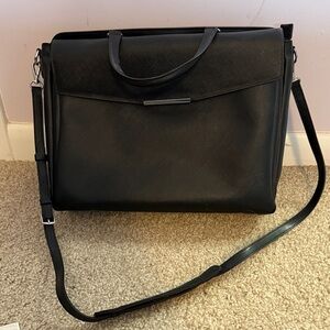 Tumi Black Leather Satchel with Adjustable Crossbody Strap